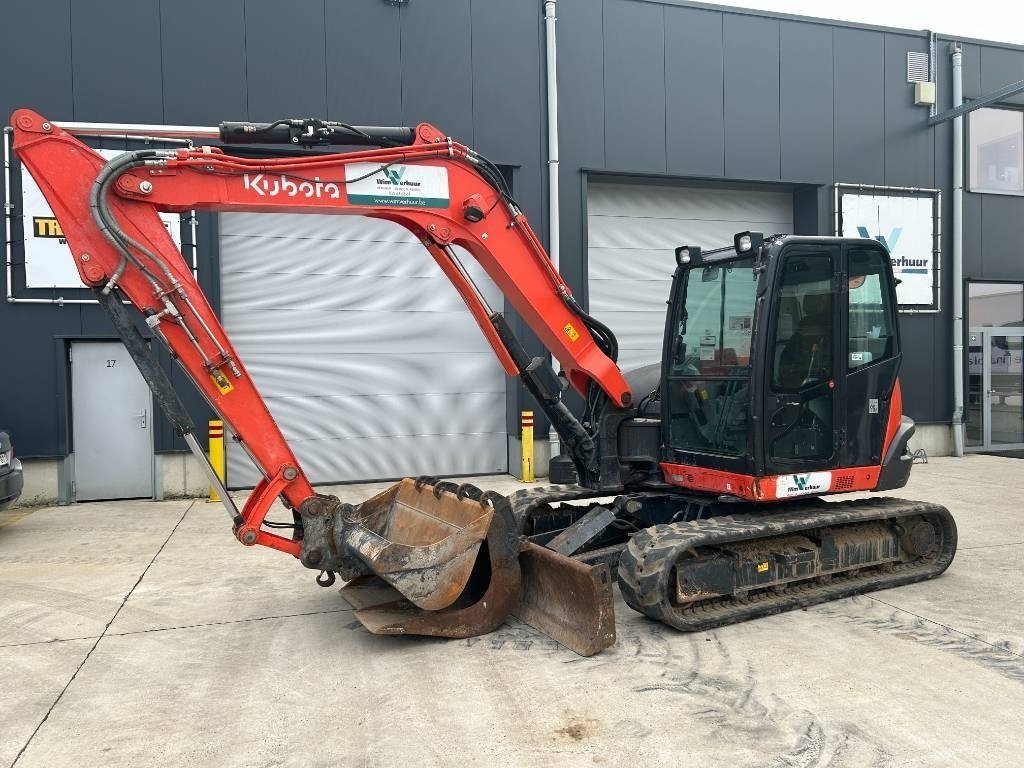 q1-2.jpg Mini pelle Kubota KX 080-4 diesel 8.44T – cabine climatisée – Image 1